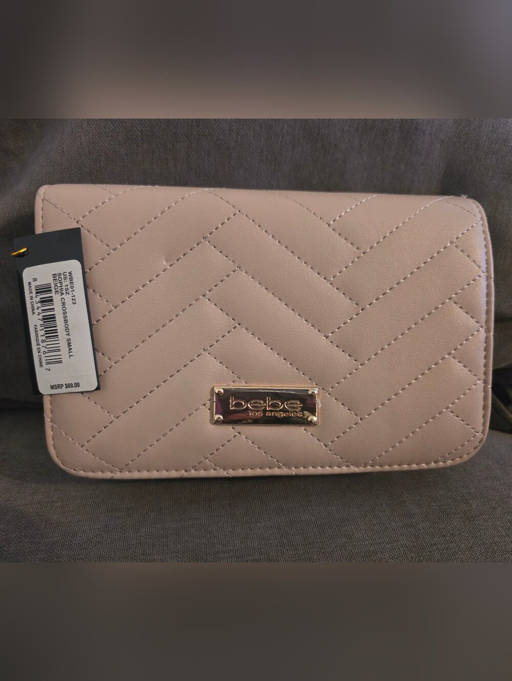 bebe Quilted Nude Clutch with Gold Logo Plate